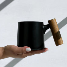Load image into Gallery viewer, Black Matte Ceramic Mug with Bamboo Handle
