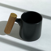 Load image into Gallery viewer, Black Matte Ceramic Mug with Bamboo Handle
